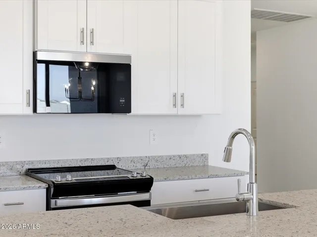 Photo is not of the actual home. Interior finishes and fixtures may vary.