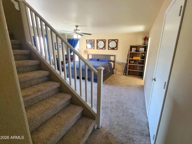 Master Bedroom. Stairs lead to private office.