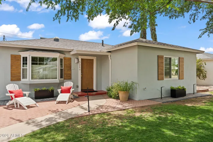 Mature landscaping and welcoming curb appeal