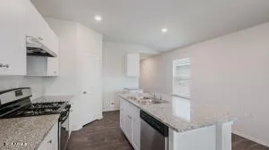 Photos are of a spec and may vary in color, interior selections and design