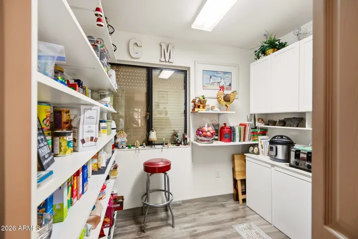 An over-the-top pantry and additional cabinets