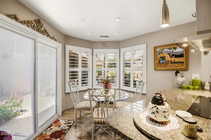 Bay window, shutters, and view of the gorgeous courtyard