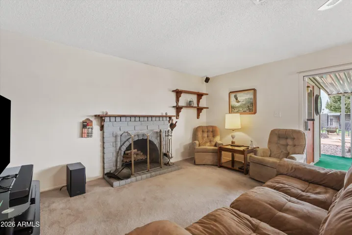 Family room with wood burning fireplace