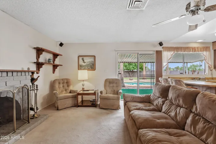 Family room with wood burning fireplace
