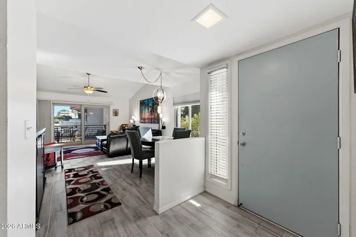 Enter into a spacious home with vaulted ceilings.