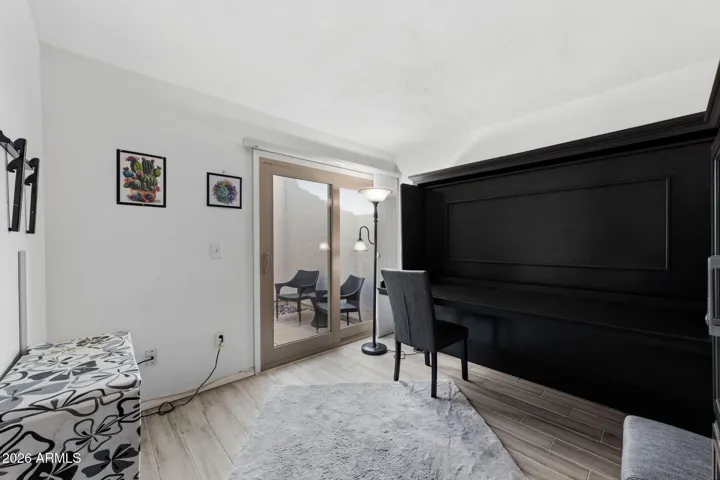 Guest bedroom has it's own little patio to relax outdoors.