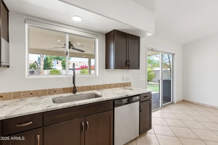 Kitchen Window Looking to Backyard