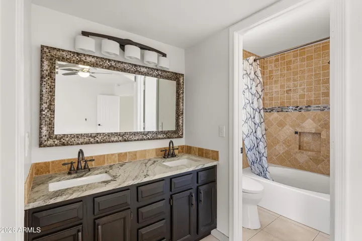 Primary Bathroom w/ Double Sinks and More Marble Counters