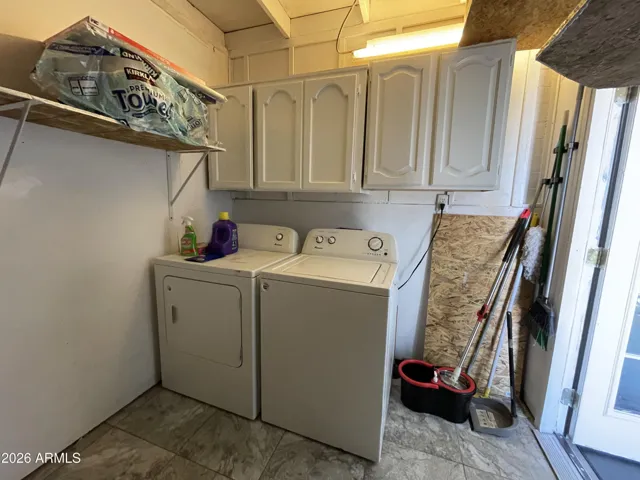 HUGE LAUNDRY AND EXTRA STORAGE ON BACK PATIO