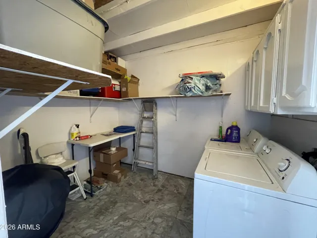 HUGE LAUNDRY AND EXTRA STORAGE ON BACK PATIO