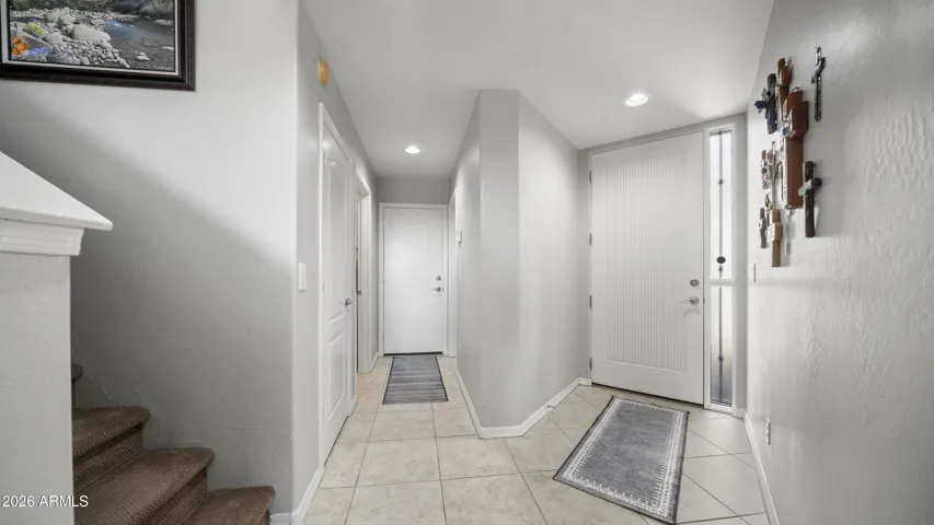 Front door entry and garage entry