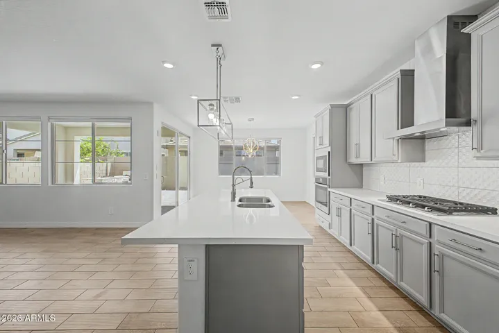 Open concept family living room, kitchen and dining, perfect for family time, or entertaining.