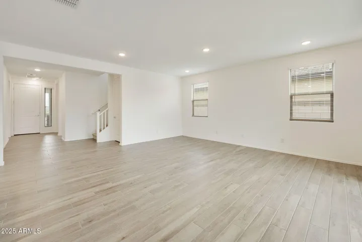 SEEMLESS WOOD PLANK TILE FLOORING DOWNSTAIRS MINUS THE BEDROOMS