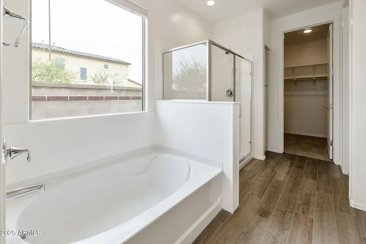 LARGE DUAL VANITIES, SEPARATE TUB AND SHOWER, LARGE WALK IN CLOSET
