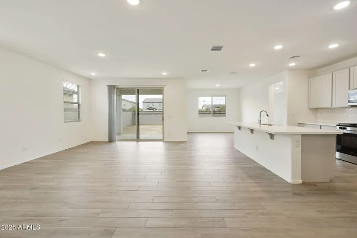 SEEMLESS WOOD PLANK TILE FLOORING DOWNSTAIRS MINUS THE BEDROOMS