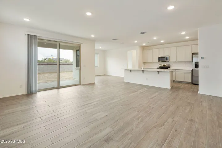 SEEMLESS WOOD PLANK TILE FLOORING DOWNSTAIRS MINUS THE BEDROOMS