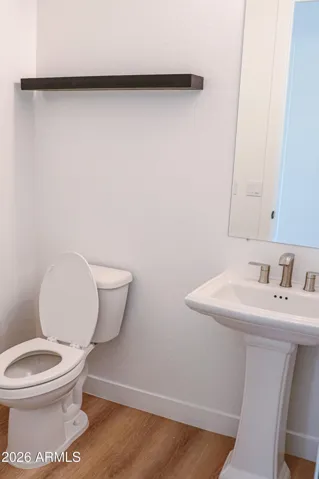 Half bathroom off of main living area.