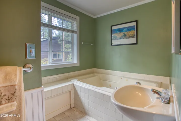 Bathroom 5 (ensuite to Bedroom 5) w/ separate tub and shower