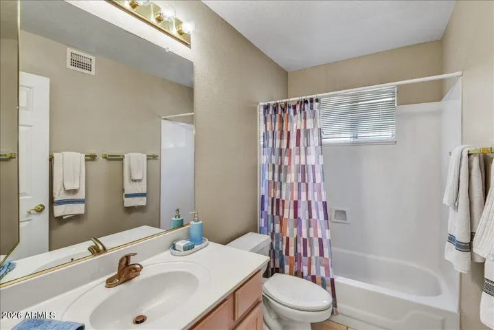 Guest bathroom is well-appointed