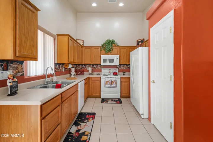 Lots of cabinets, pantry and new refrigerator.