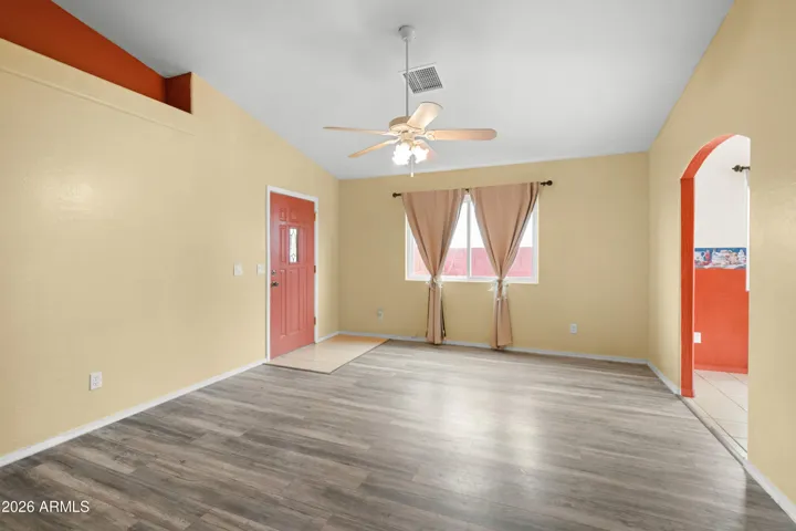 Front room. Bright and Cheery! Nice vinyl plank flooring !