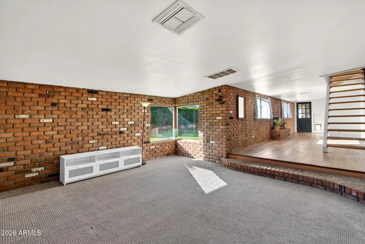 The only room with carpet. Use as a large family room or billiards room, etc!
