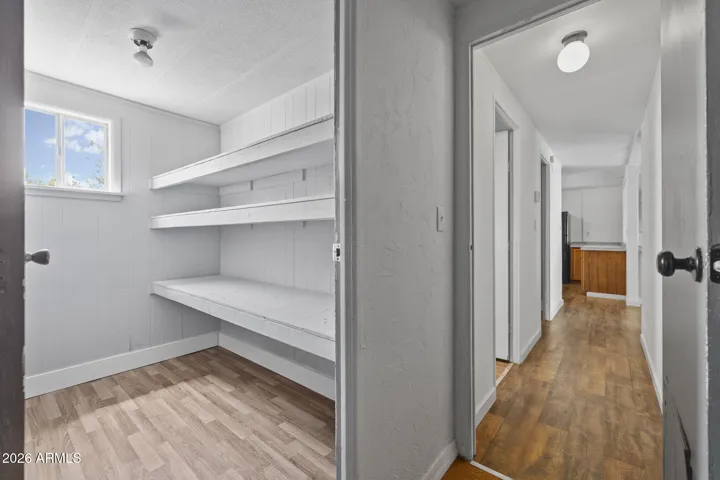Walk in closet / storage in Primary Bedroom.
