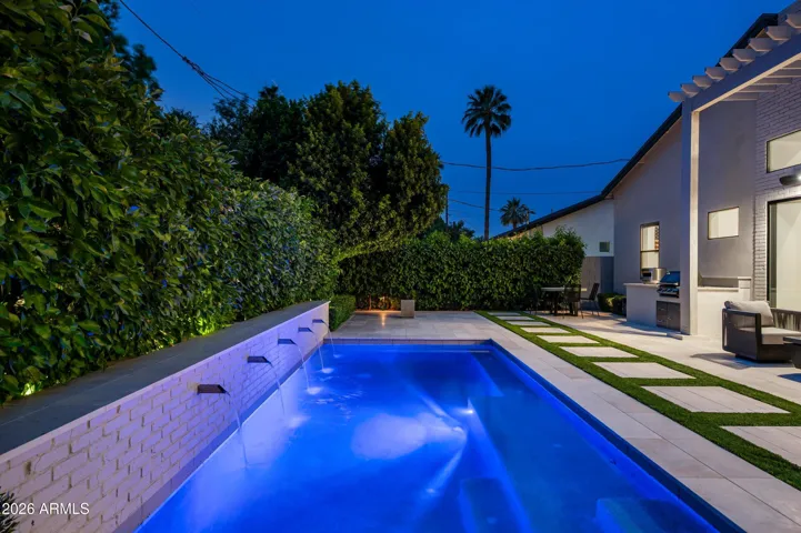 Gorgeous Pool with Water Feature and Lights