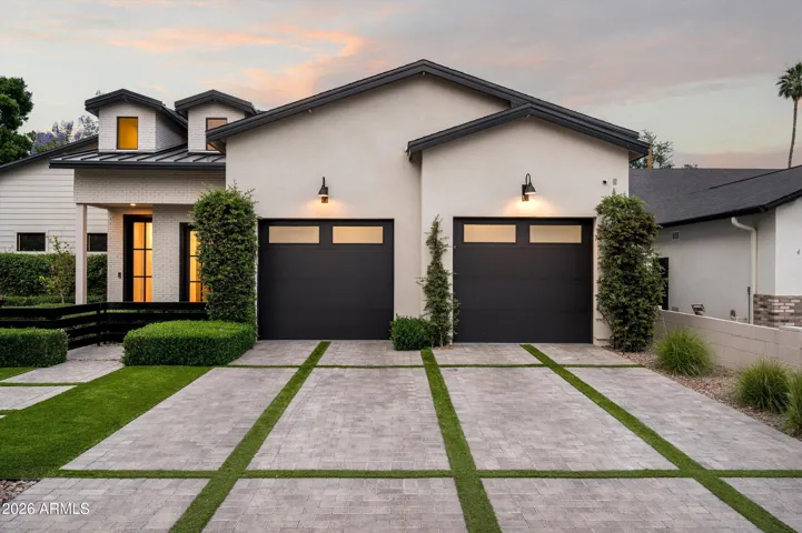 Modern European Inspired Turf and Paver Driveway