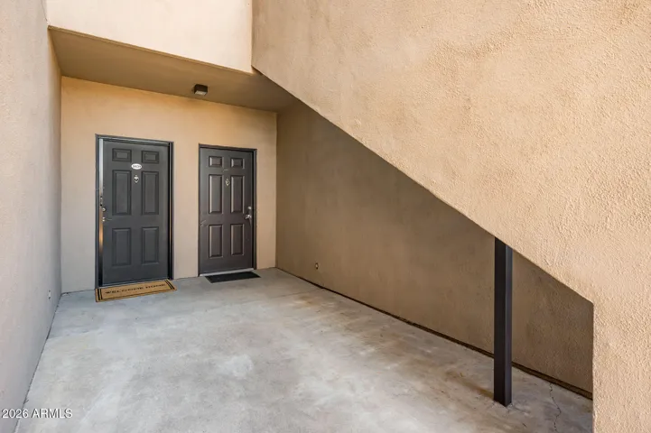Front door includes a retractable ghost screen