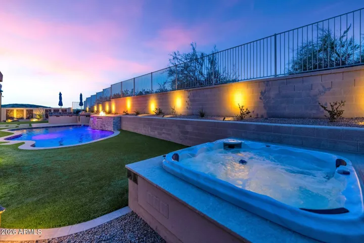 Spa, decorative landscape lighting, incredible views & pebble tech pool.