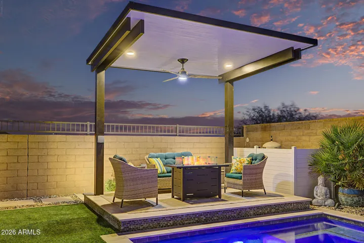 Pergola adjacent to pool; is equipped with electricity for a spa
