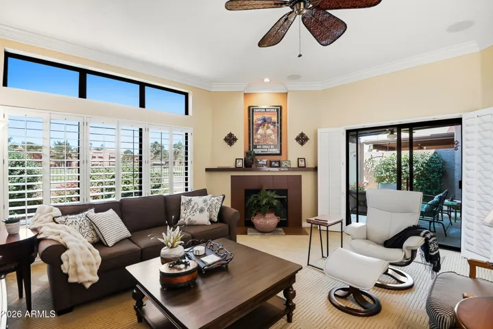 Living Room with Large Windows to Golf Course