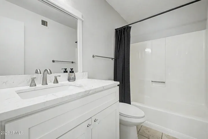 New cabinet, counter and light fixture. Full bath with tub/shower combo.