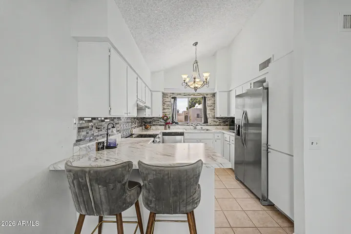 Perfect spot to sit and watch the cook prepare meals!