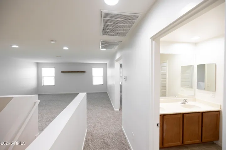 Upstairs loft, with hall bath to right