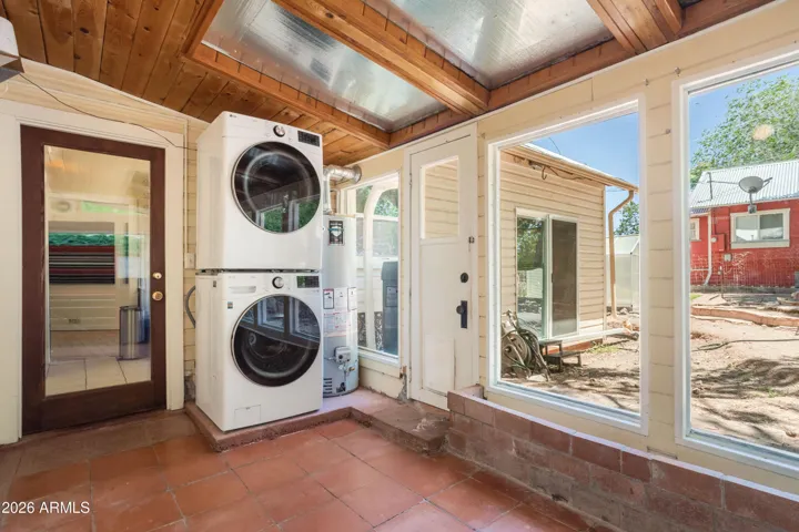 Wash your laundry in style in this bright Arizona room overlooking the mini vinyard!