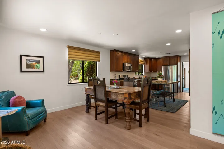 Open-concept layout seamlessly connects living, dining, and kitchen areas