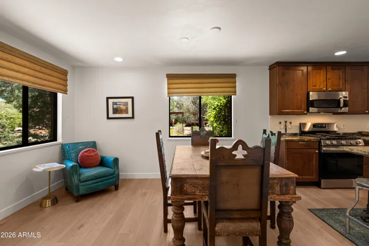 Dining area positioned to enjoy beautiful outdoor gardens