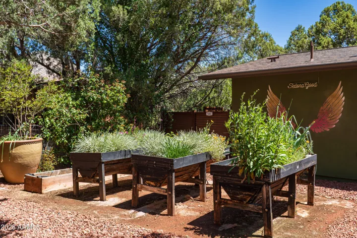 Raised garden beds for herbs, vegetables, and flowers