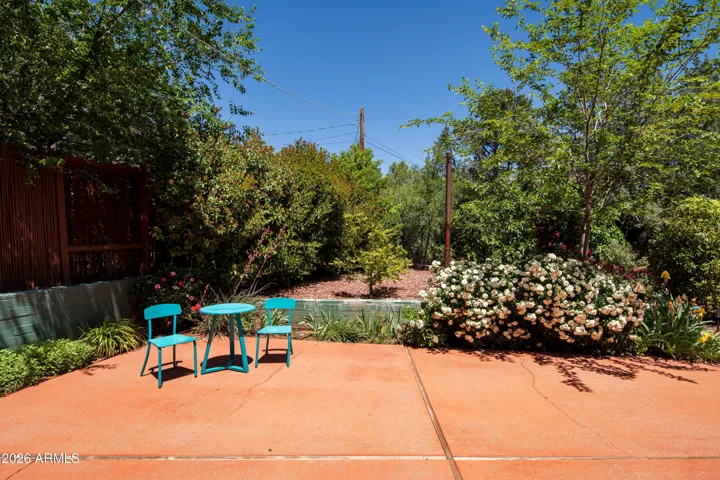 Expansive outdoor living spaces blend seamlessly with the surrounding landscape