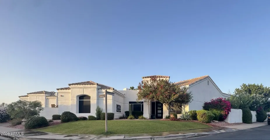 Large corner lot and front of this beautiful home.