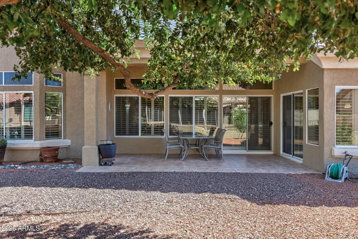 68 VIEW OF REAR COVERED PATIO.
