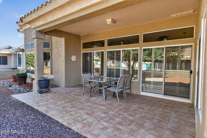 72 - ALT. VIEW OF REAR COVERED PATIO.