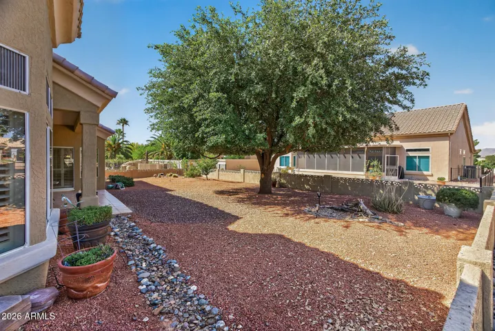 66 SPACIOUS REAR YARD PROFESSIONALY LANDSCAPED.