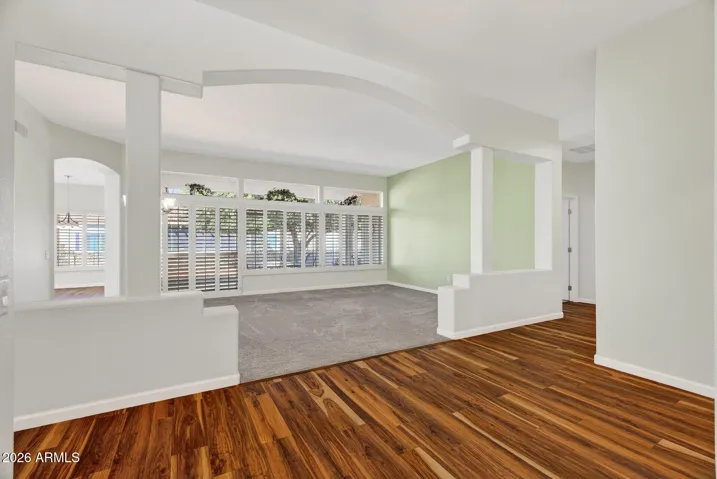 13 VIEW OF LIVING/DINING ROOM FROM FRONT FOYER