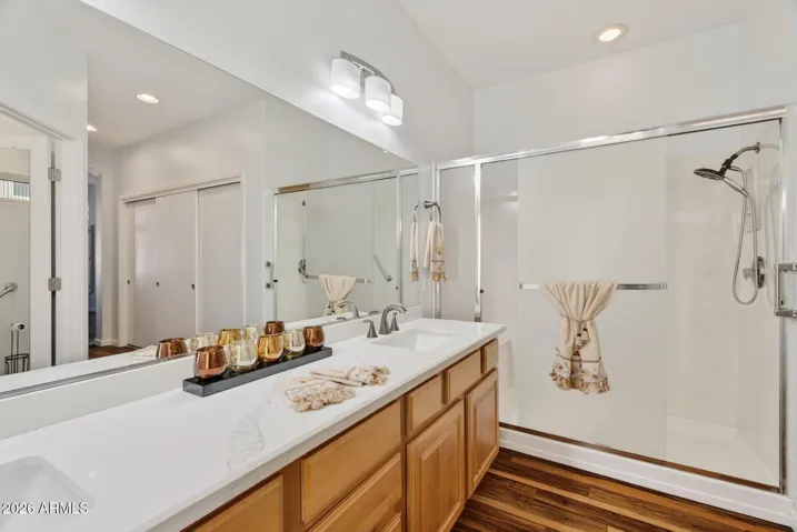 58 MASTER SHOWER WITH DUAL SINK VANITY AND PVT. RAISED COMMODE.