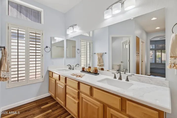 59 MASTER DUAL SINK VANITY WITH LEVERED FAUCETS.