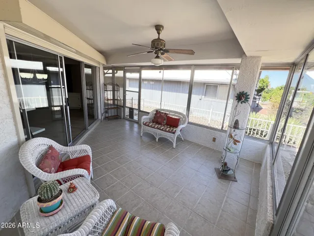 Enclosed patio with golf course views