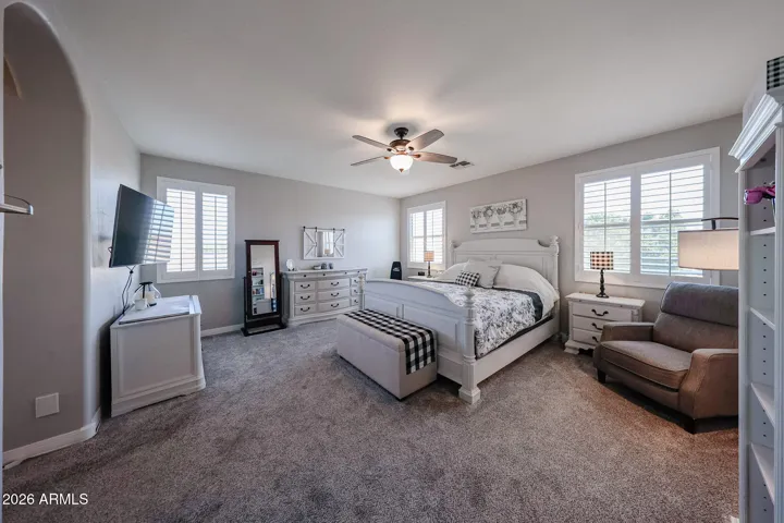 DOUBLE DOOR ENTRY INTO SPACIOUS PRIMARY SUITE